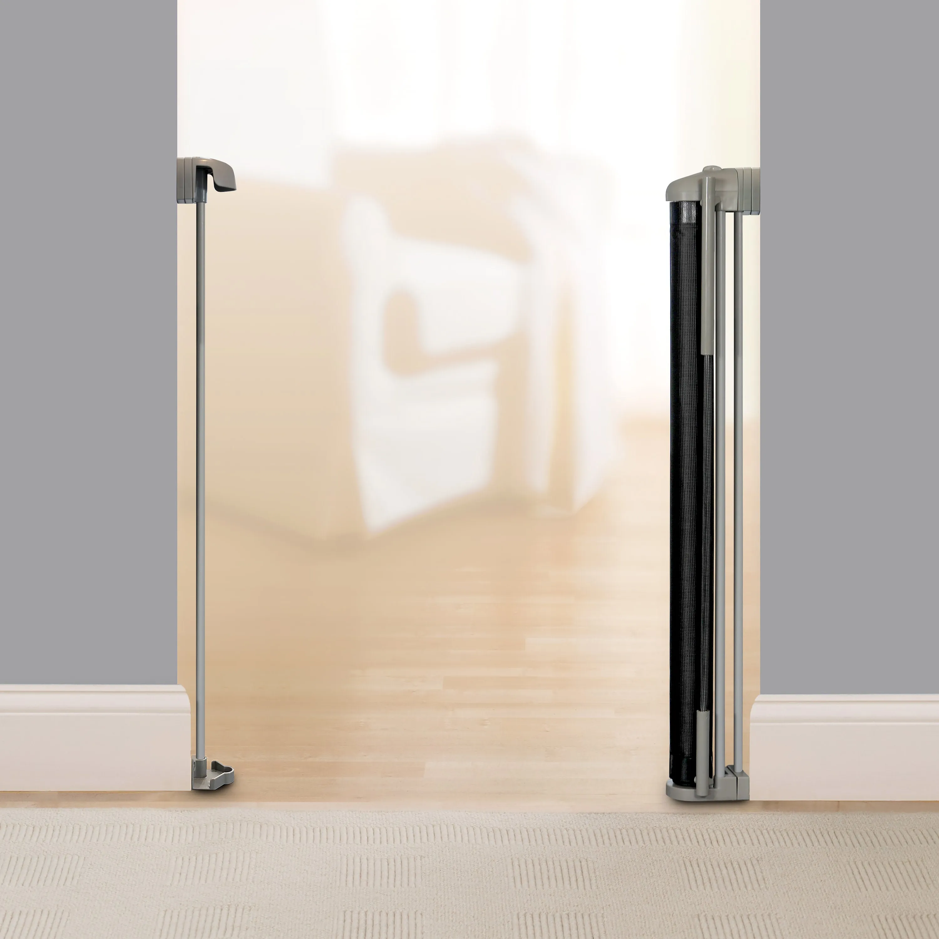 The Thruway 52W Series Pet and Baby Retractable Gate with Tuck Away Mesh, Openings up to 52" Wide - Black