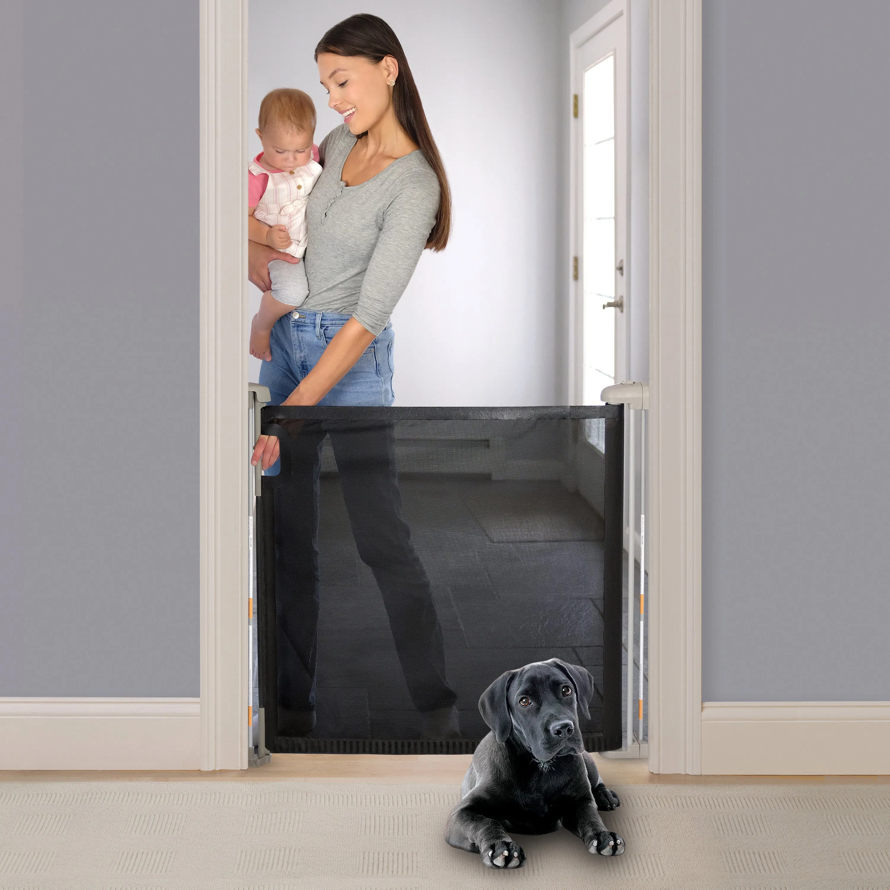 The Thruway 52W Series Pet and Baby Retractable Gate with Tuck Away Mesh, Openings up to 52" Wide - Black