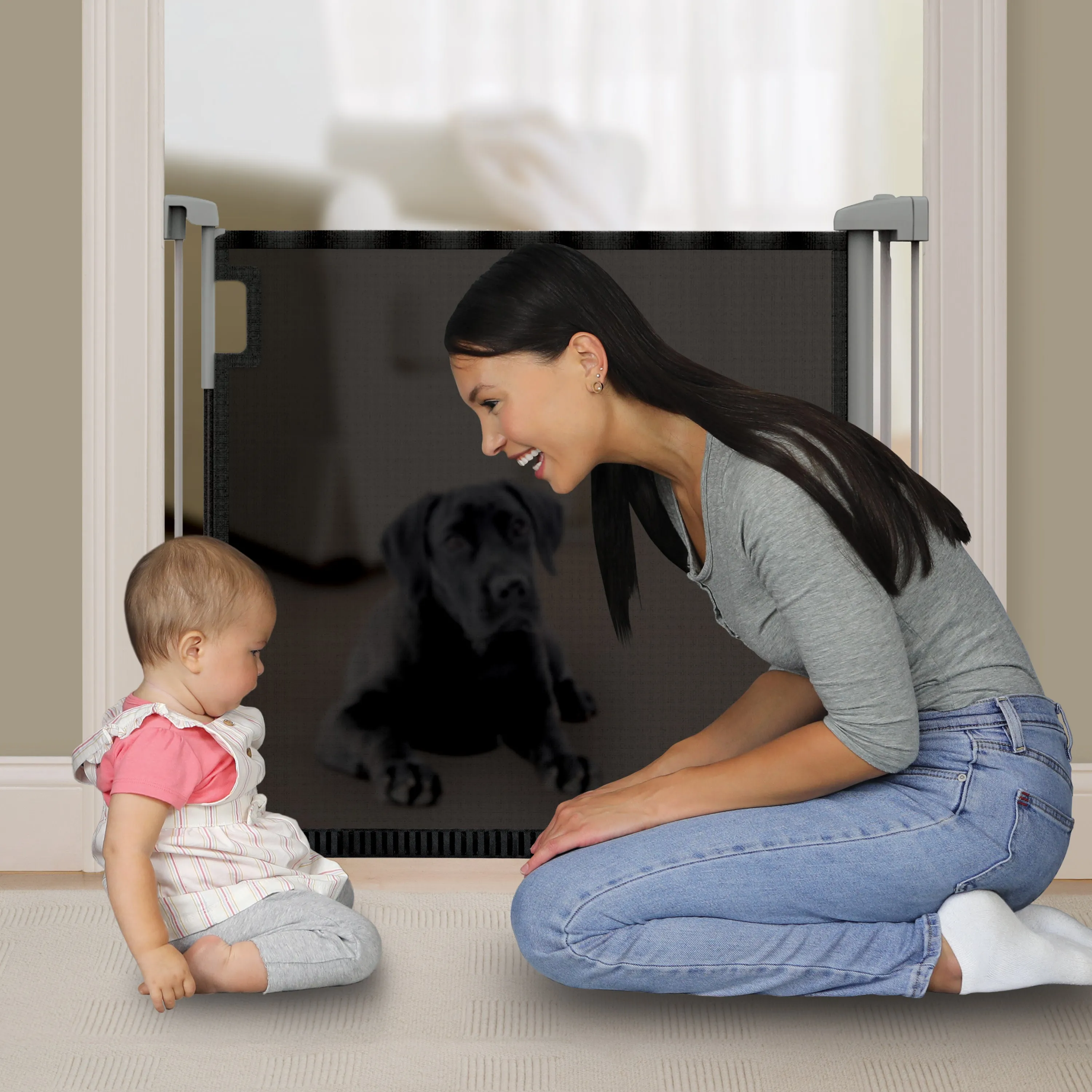 The Thruway 52W Series Pet and Baby Retractable Gate with Tuck Away Mesh, Openings up to 52" Wide - Black