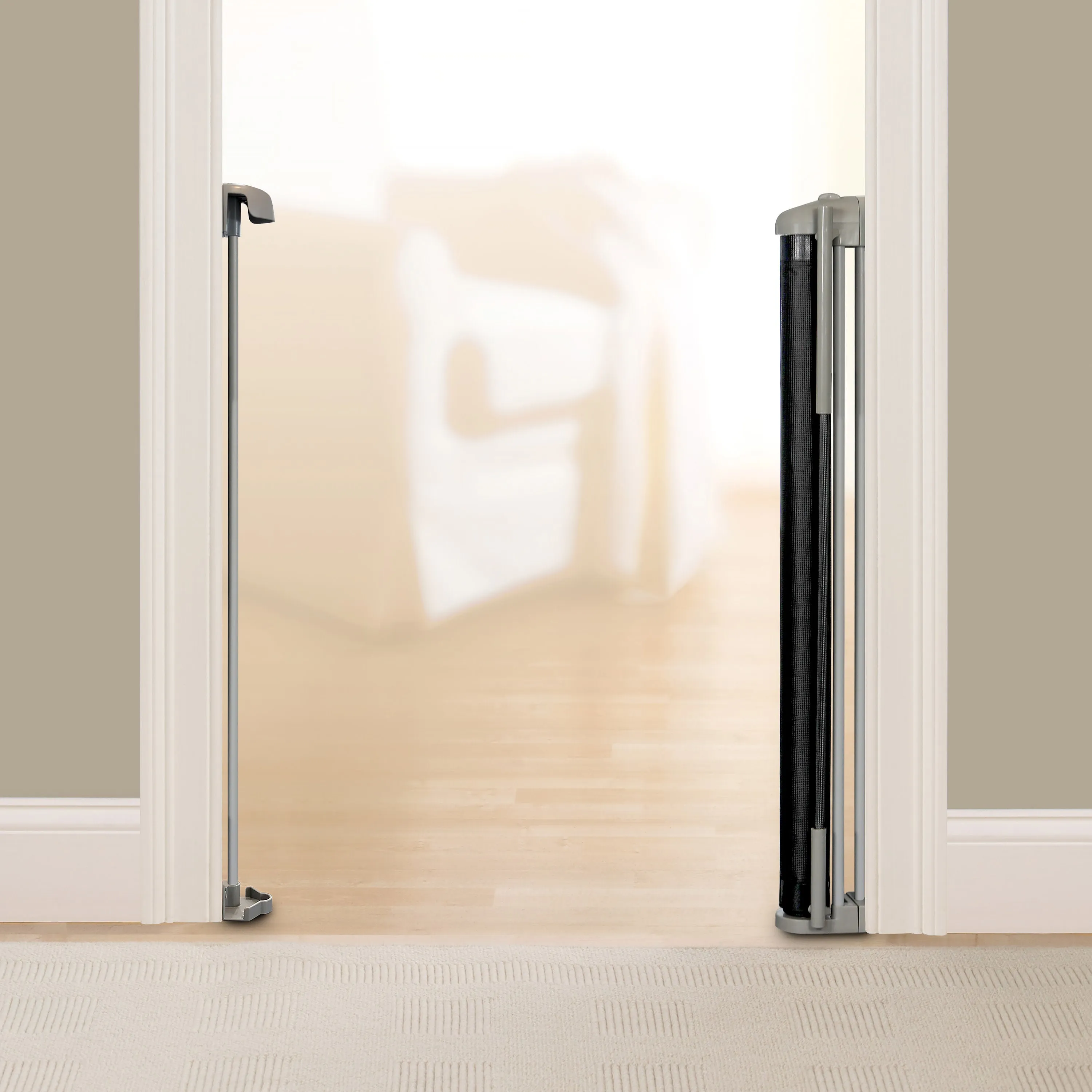 The Thruway 52W Series Pet and Baby Retractable Gate with Tuck Away Mesh, Openings up to 52" Wide - Black